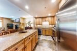 Kitchen with granite countertops and high end appliances